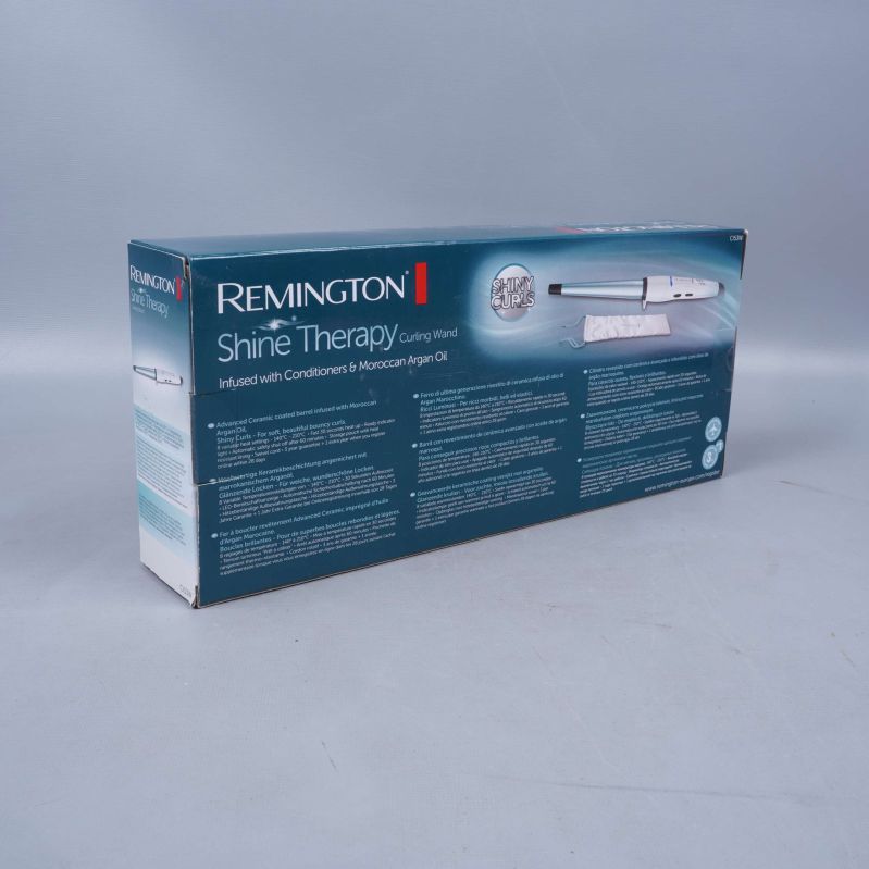 Baksidan av Remington Shine Therapy locktångsförpackning
