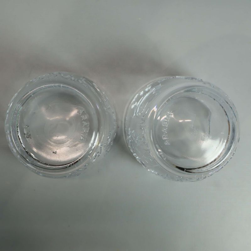 Botten av två Mumin-glas sedd ovanifrån