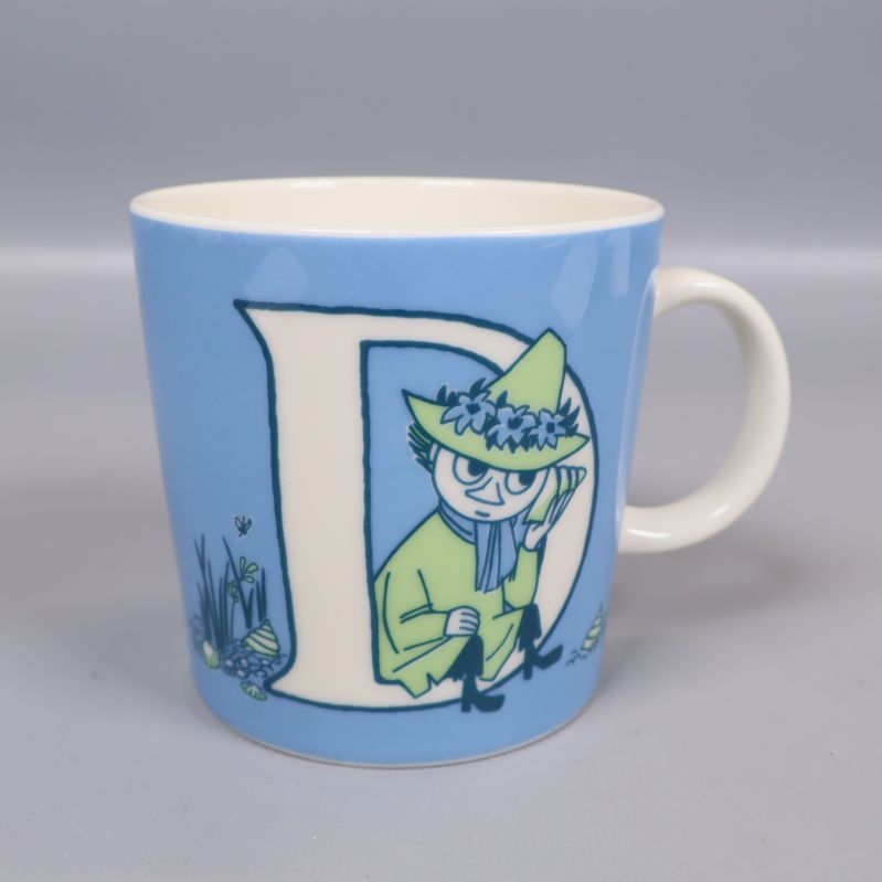 Mumintrollet mugg med bokstaven D och gröna detaljer