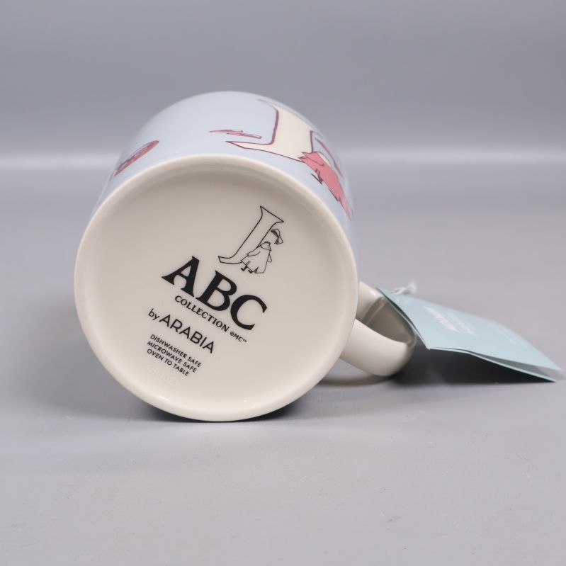 Muggens botten med Arabia-logo och ABC Collection-tryck