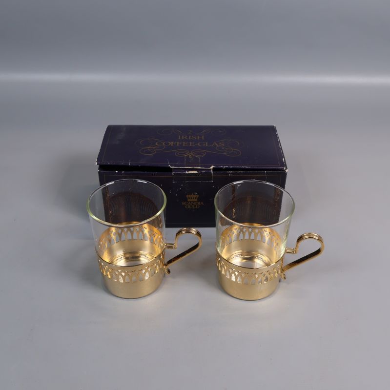 Två Irish coffeeglas med gulddetaljer och originalförpackning