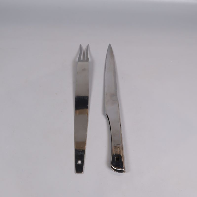 Trancherset kniv och gaffel i blankt stål
