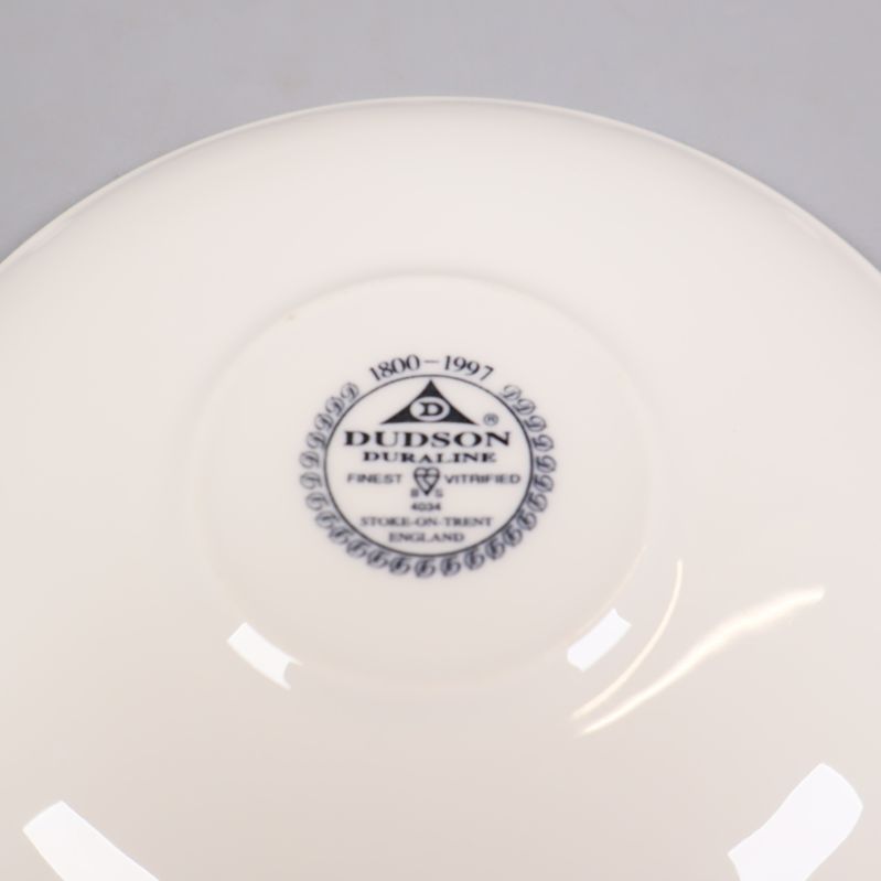 Närbild stämpel under fat från Dudson