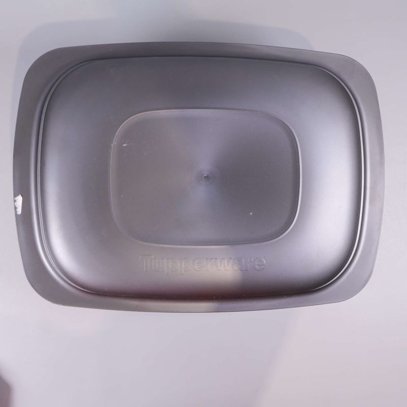 Mattsvart Tupperware lock sedd ovanifrån