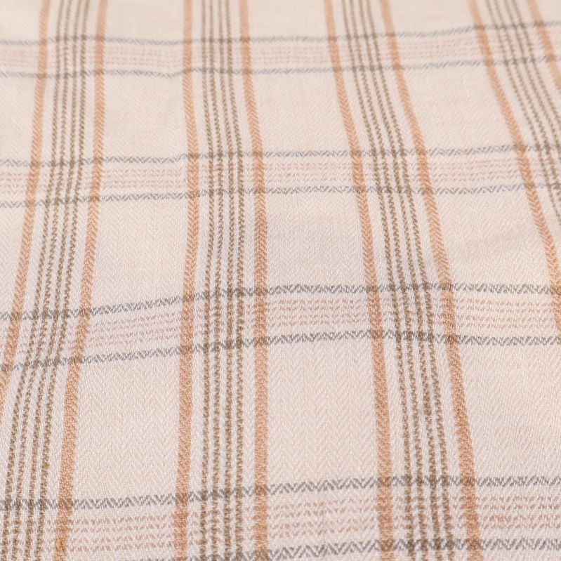Närbild av tyget rutiga tyg i beige och brunt
