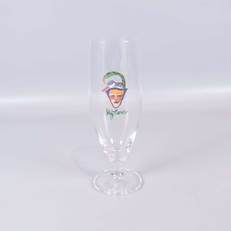Helt ölglas med färgglad maskillustration och text