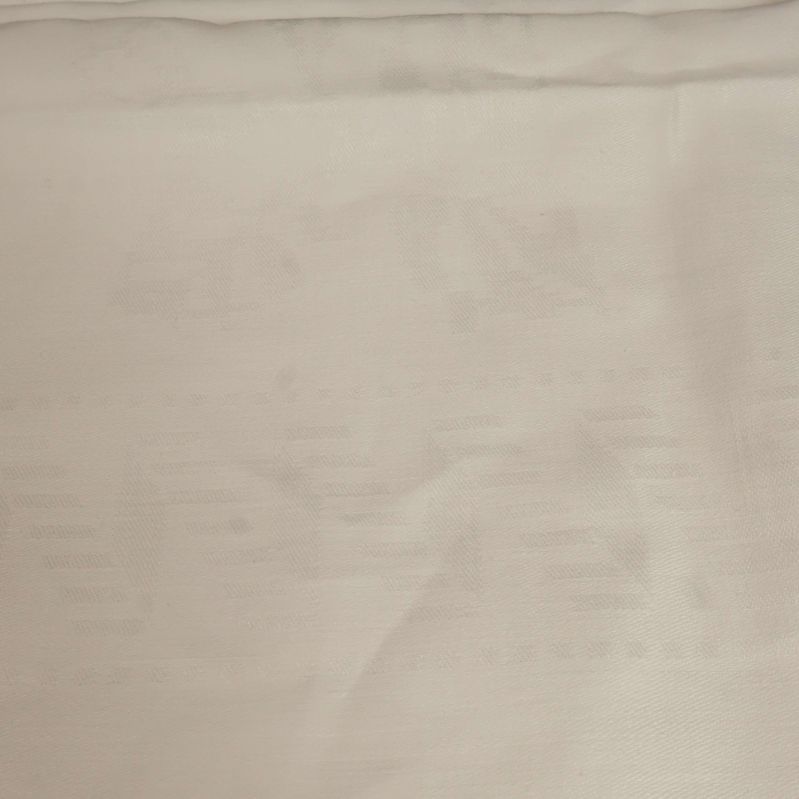 Närbild av mönster i vit textil
