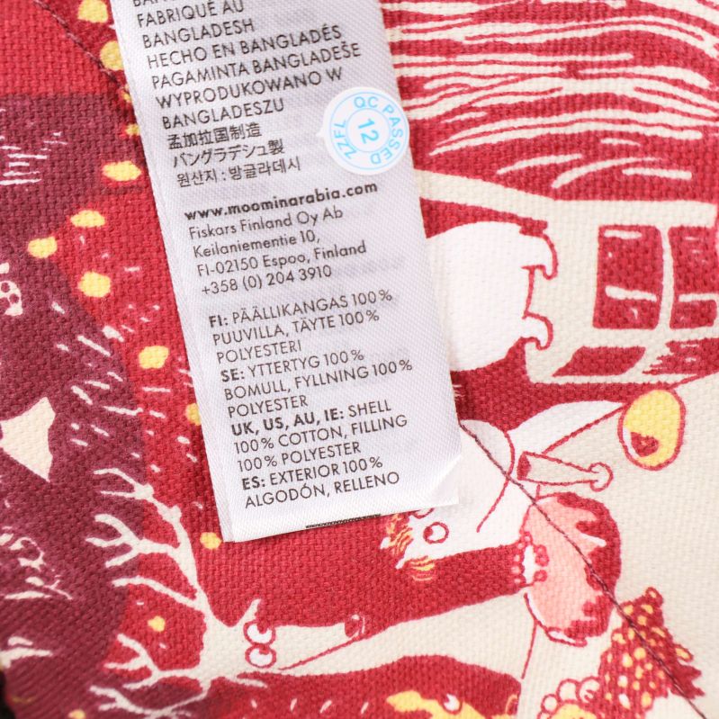 Materiallapp visar 100% bomull och polyester