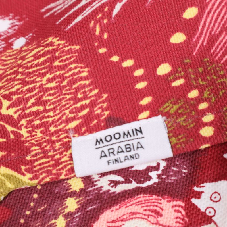 Textiletikett med texten MOOMIN ARABIA FINLAND