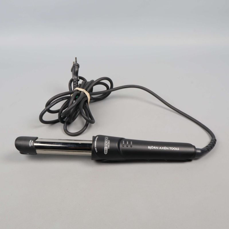 Svart locktång med flexibel kabel