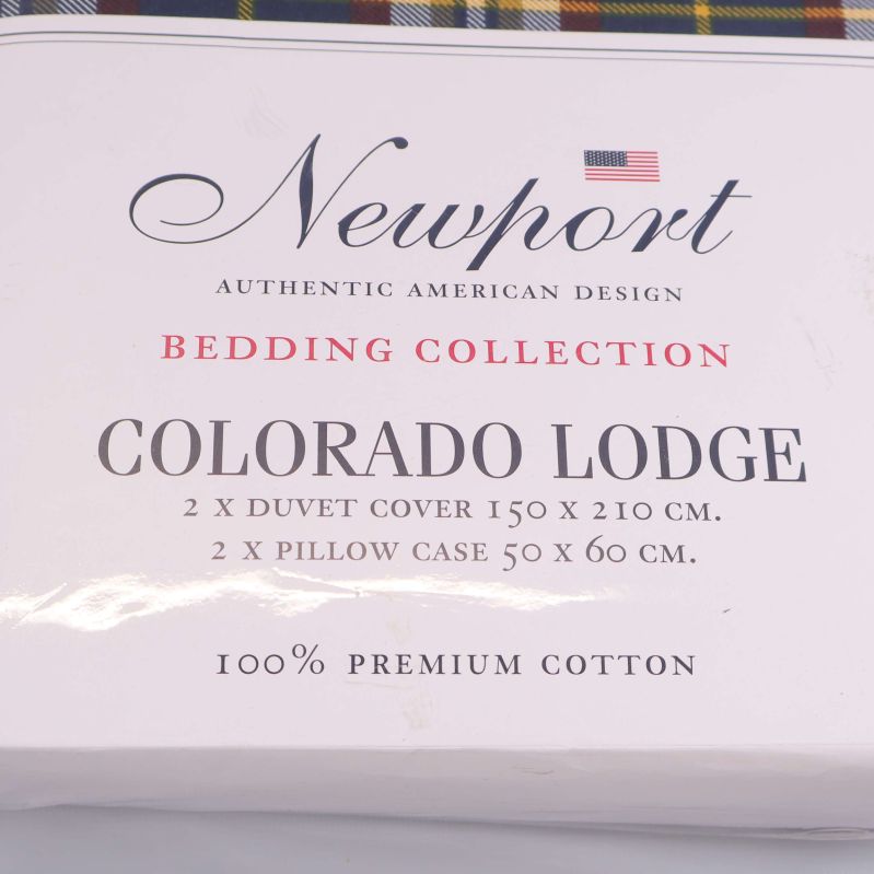 Närbild av texten Colorado Lodge och mått på förpackningen