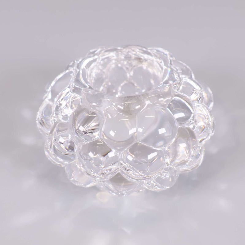 Ljusstake i klart glas med bubblig yta framifrån