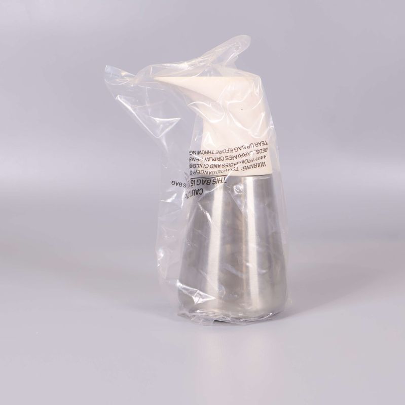 Termoskanna från sidan i genomskinlig plastpåse