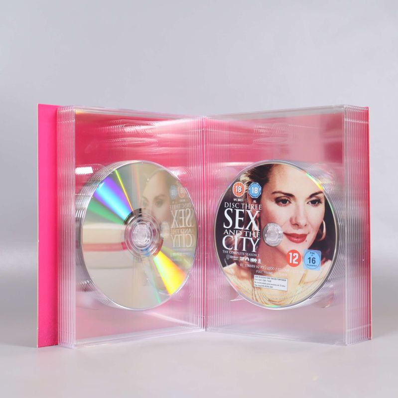 Två DVD-skivor från Sex and the City i genomskinligt fodral