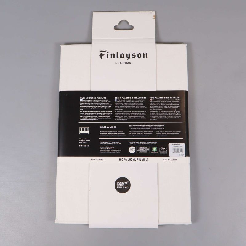 Baksida av förpackning till vitt babysängslakan från Finlayson