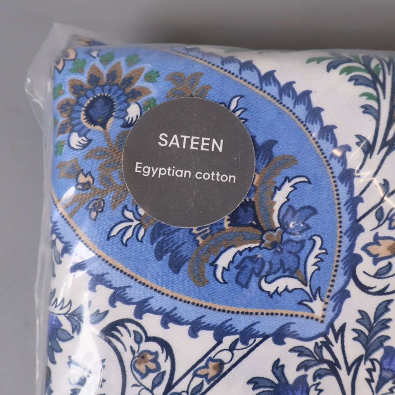 Närbild på hörn med etikett Egyptisk bomull satin