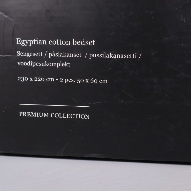 Text på förpackning: egyptisk bomull och storlek