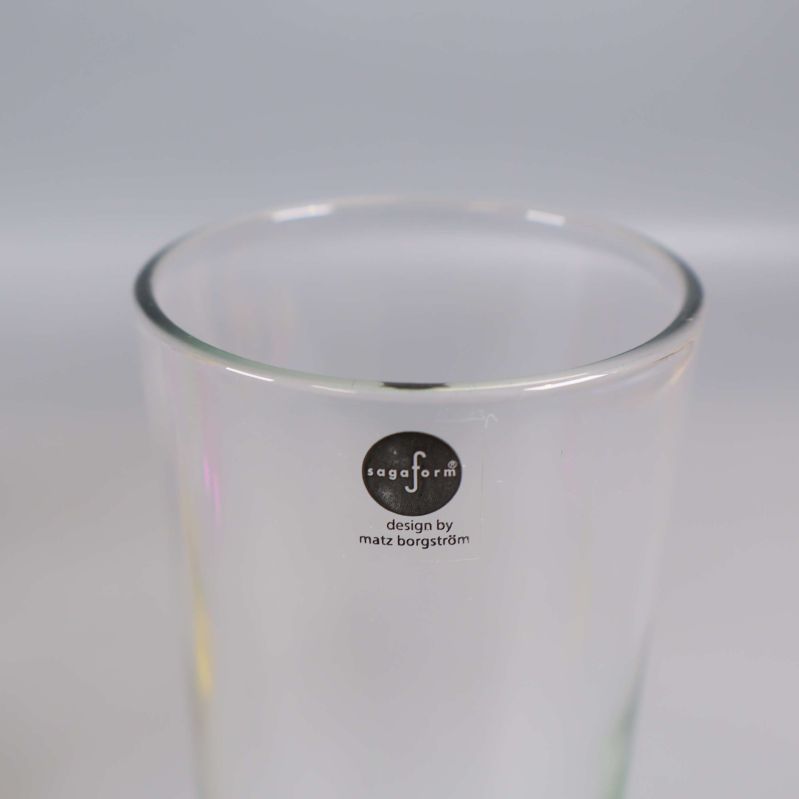 Etikett på glas med text om design av Matz Borgström