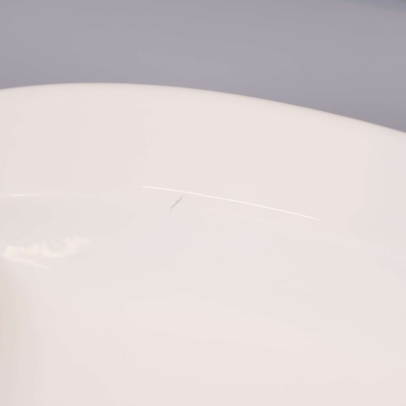 Detaljbild med liten repa