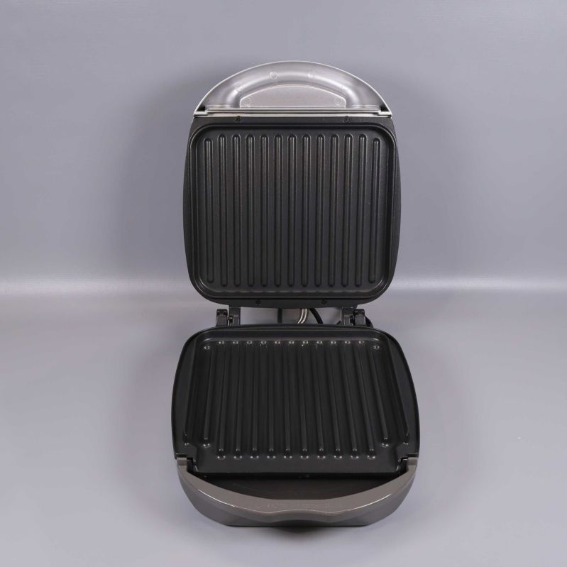 Öppen bordsgrill med räfflade nonstick-plattor