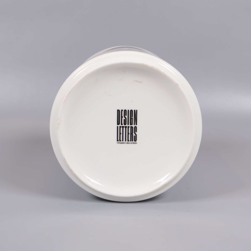 Burkens botten med Design Letters-logo
