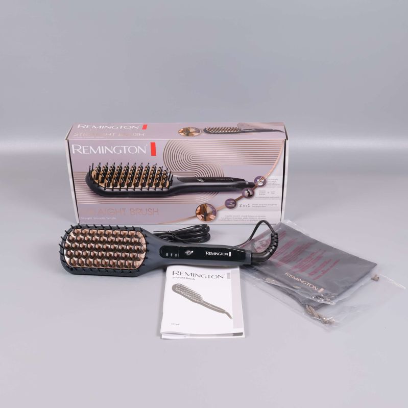 Remington rakborste med förpackning, väska och manual