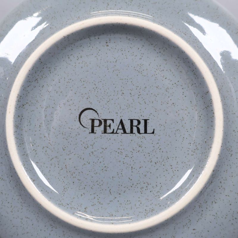 Närbild på logotypen Pearl på skålens botten