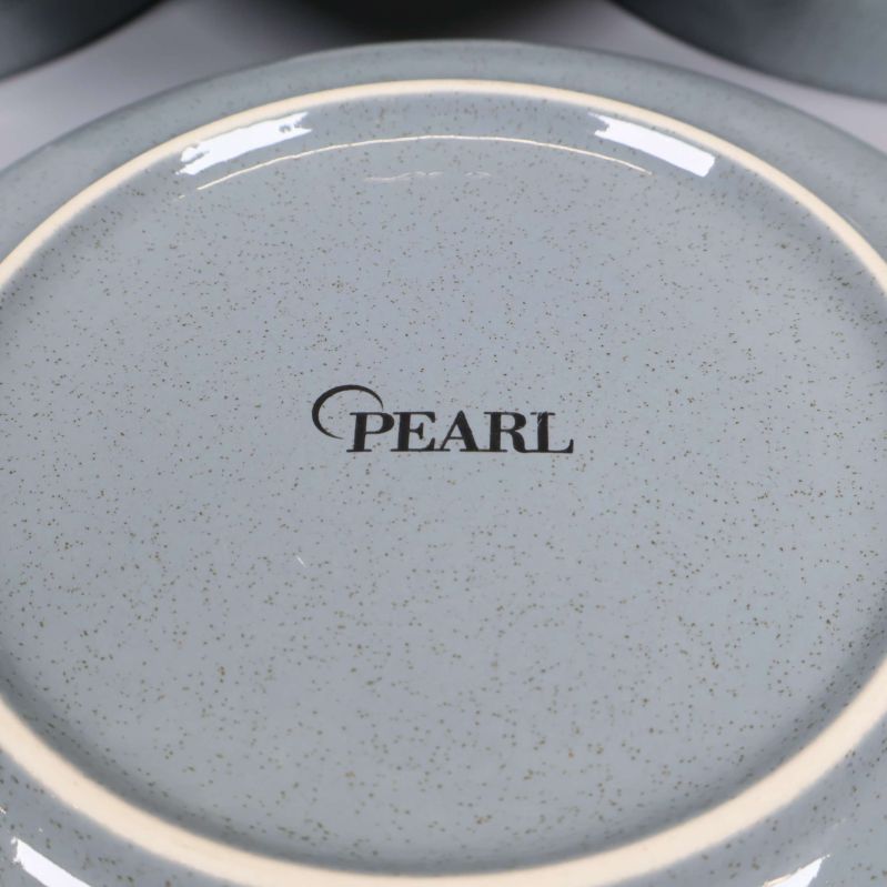 Närbild på undersidan av skål med Pearl-logga