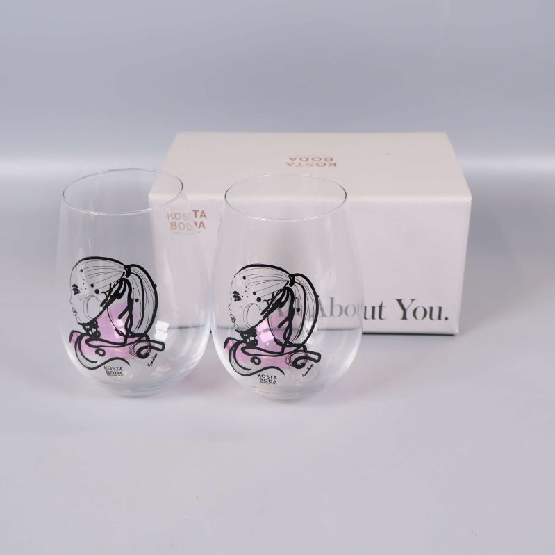 Två glas med motiv och originalkartong