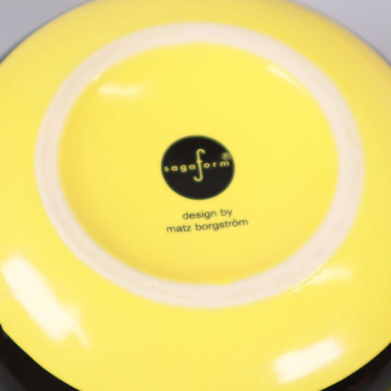 Botten av fällan med Sagaform logotyp