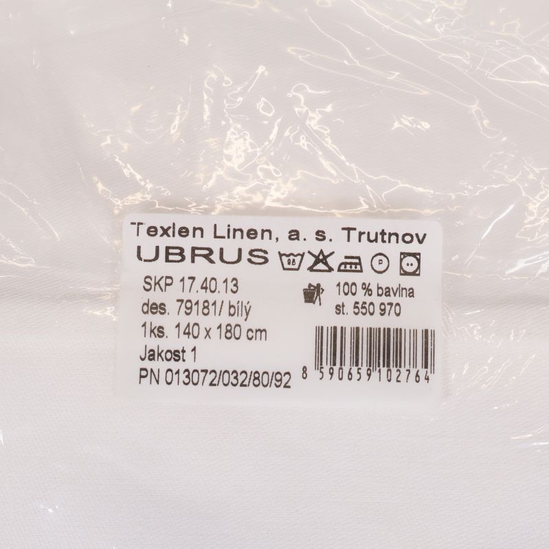 Närbild av etikett med Texlen Linen och mått