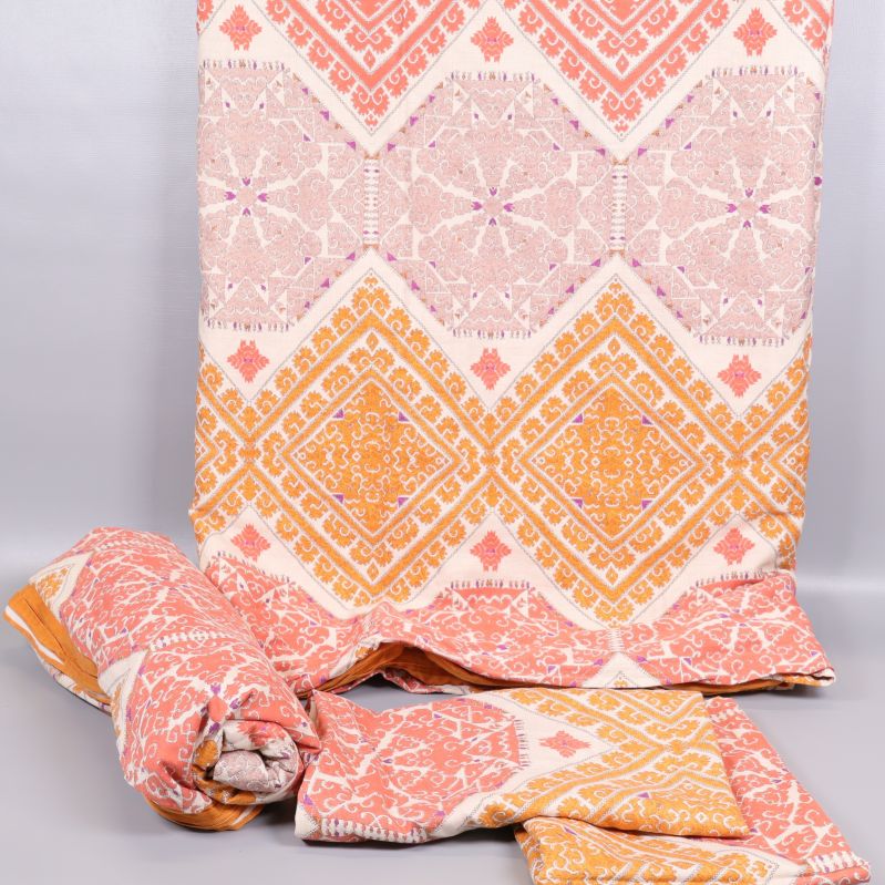 Påslakan och örngott med orange geometriskt mönster