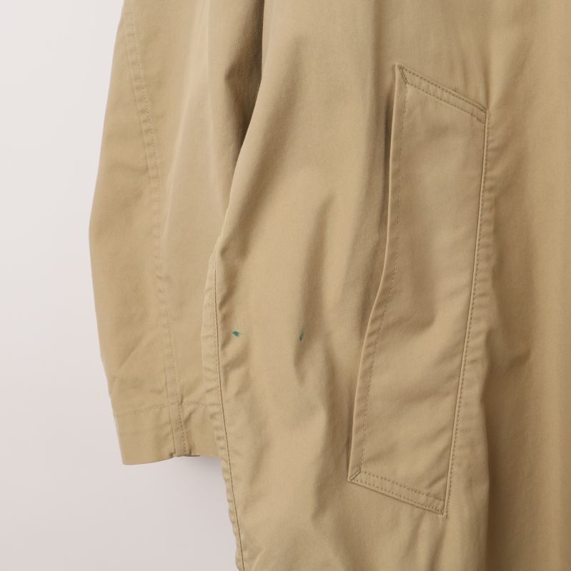 Ficka på Trenchcoat i närbild