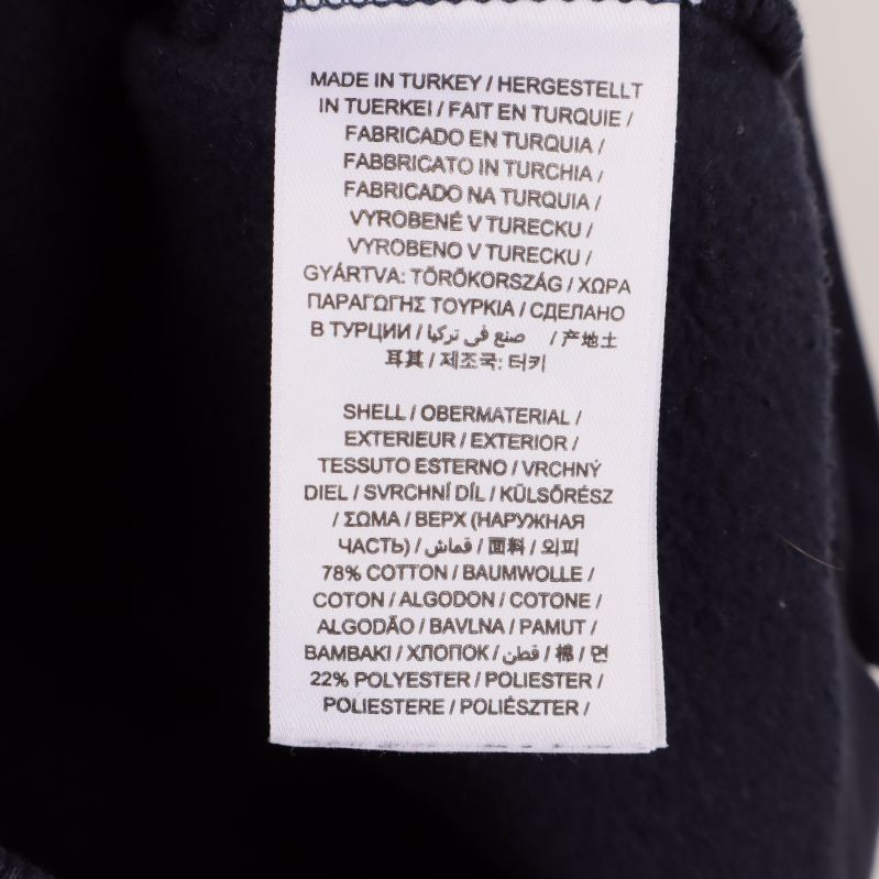 Materialetikett på Gant huvtröja