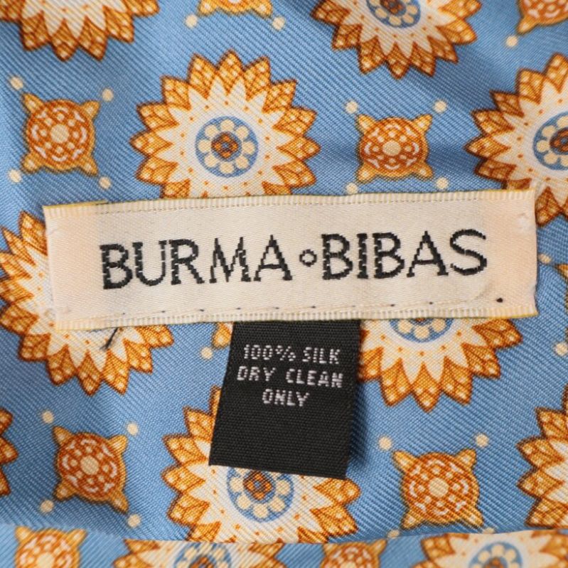 Märkesetikett på halsduken, Burma Bibas