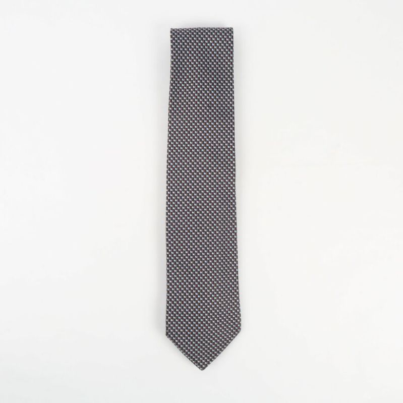 Grafiskt mönstrad slips i ljusblått och brunt