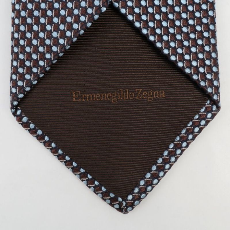 Ermenegildo Zegna, märkesdetalj på slipsens insida