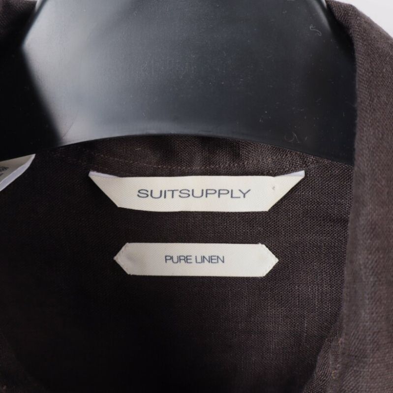Suitsupply etiketten och materialinformation