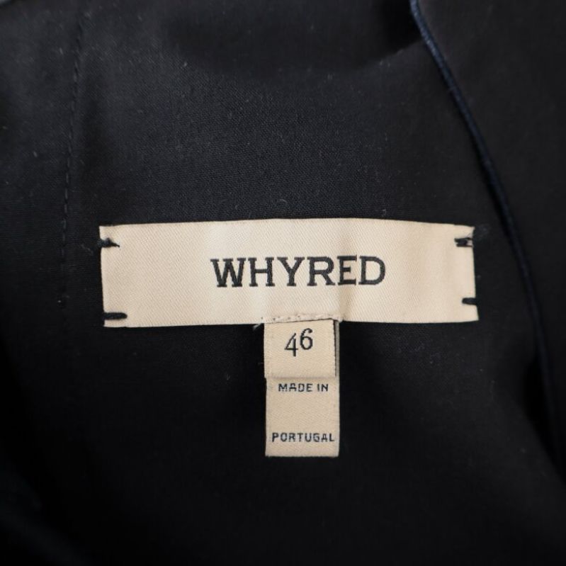 Närbild av varumärket Whyred och storleksetikett