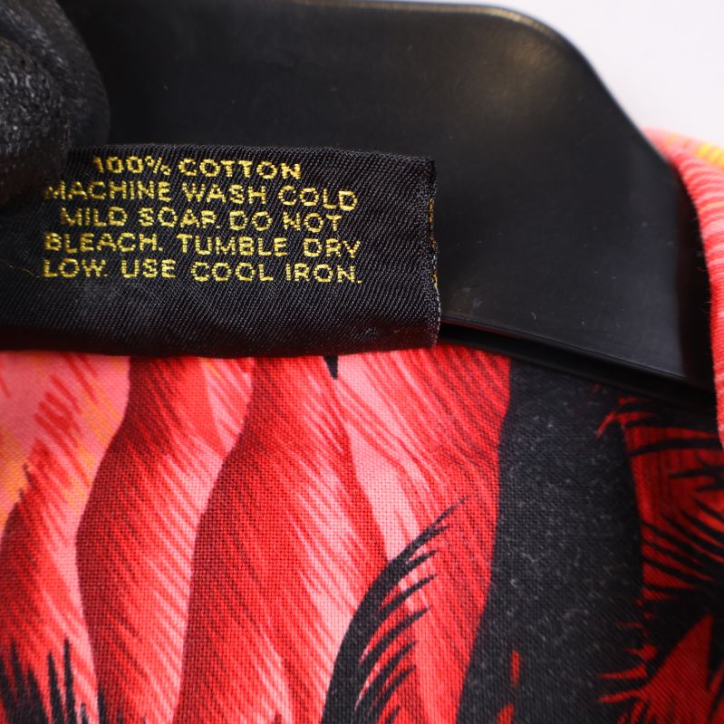 Etikett med material '100% cotton'
