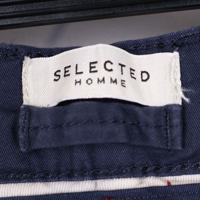 Varumärkesetikett Selected Homme