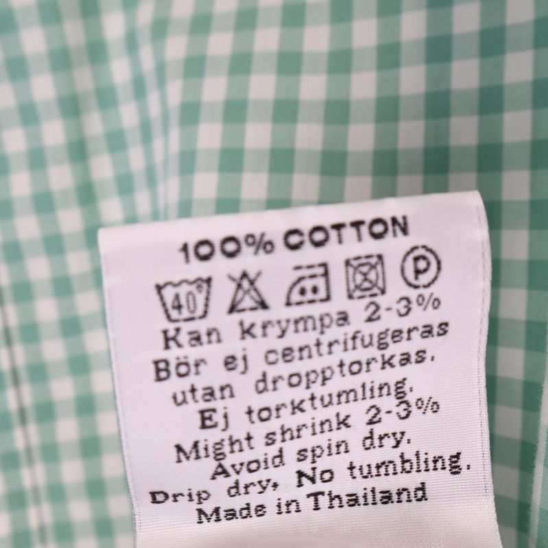 Tvättinstruktioner och materialetikett