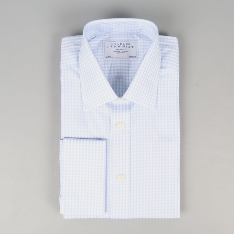 Vikt ljusblå skjorta Ljusblå rutig skjorta, vikt