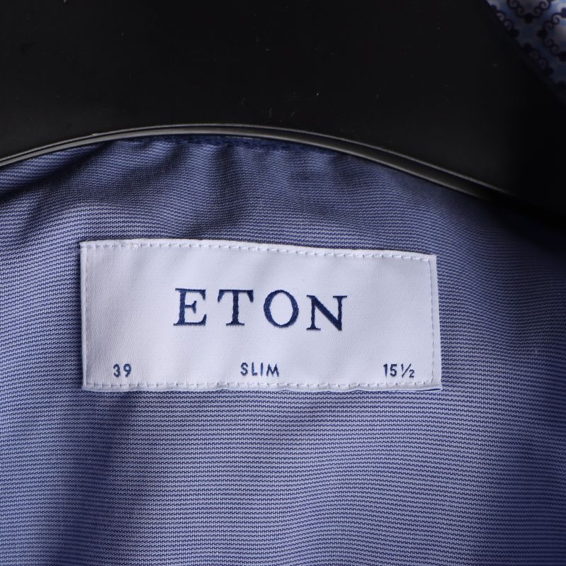 Märkesetikett för Eton med storleksinformation