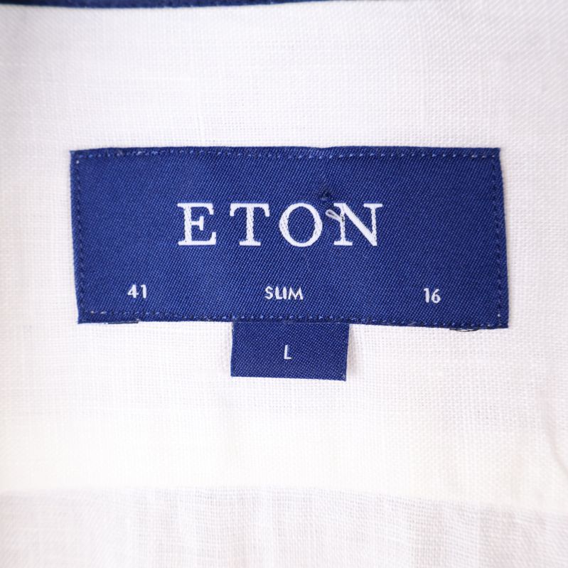 Närbild på Eton etikett och storlek