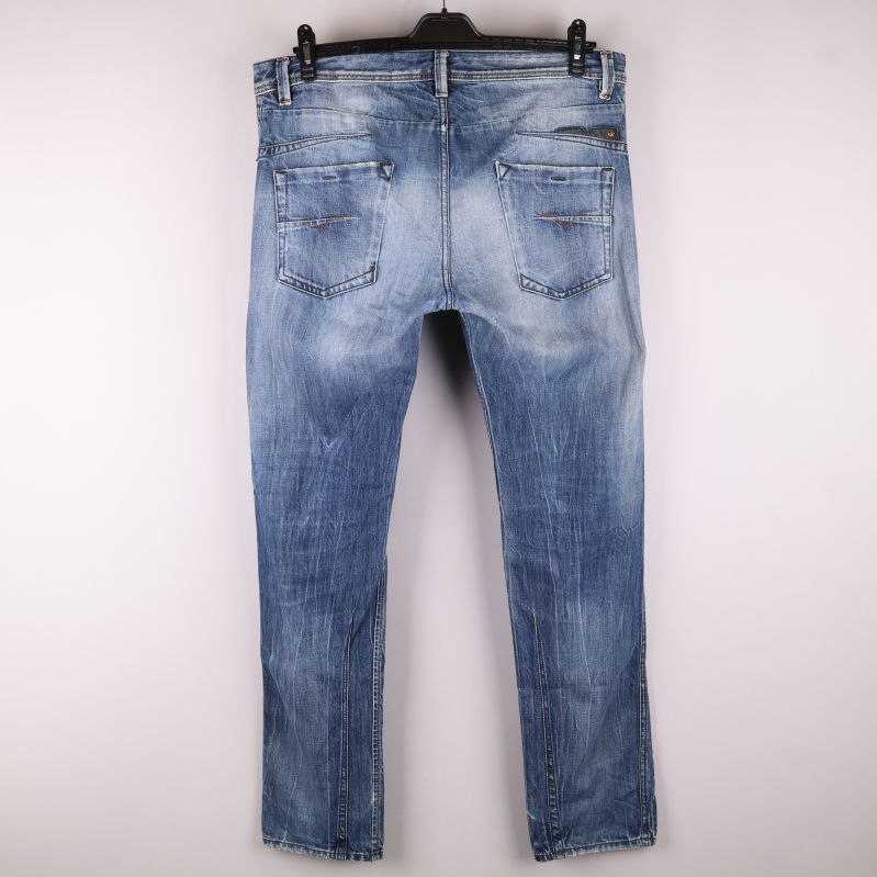 Baksida av blå jeans