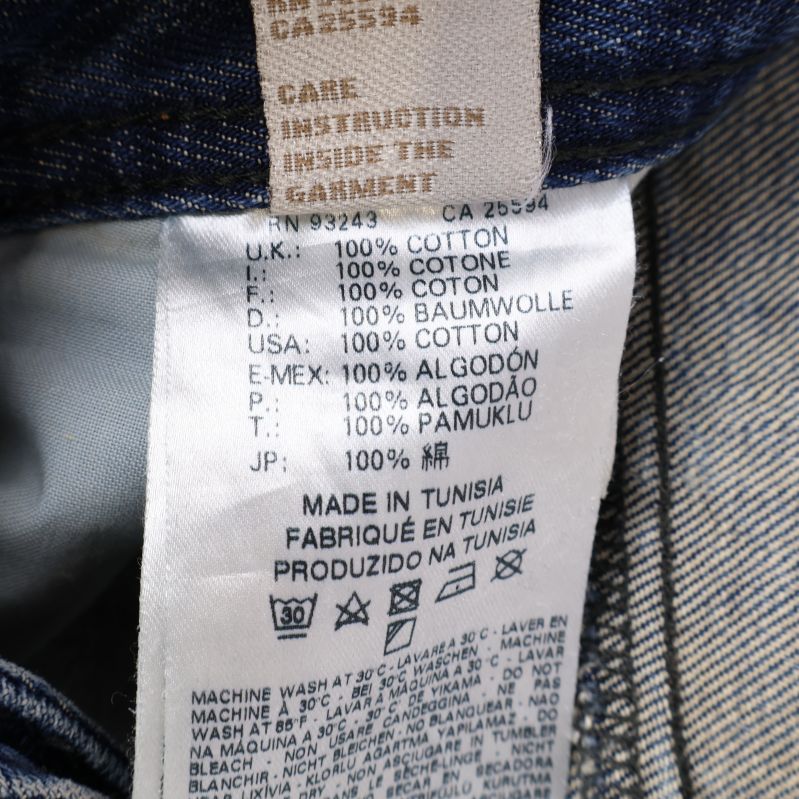 Etikett med materialinformation för jeans