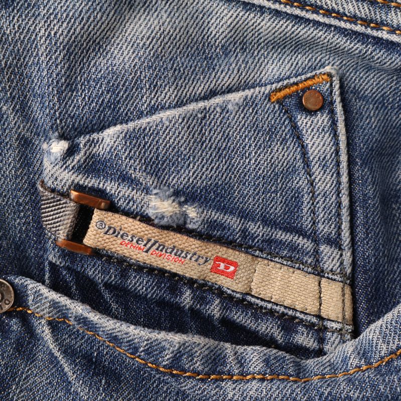 Diesellogotyp på jeansfickan