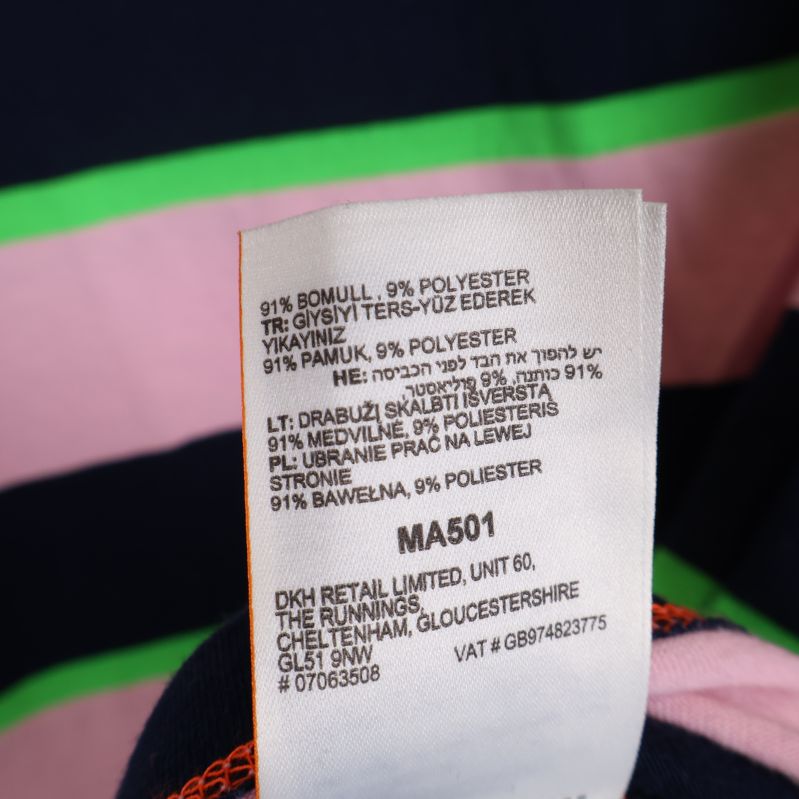 Materialetikett visar 91% bomull och 9% polyester