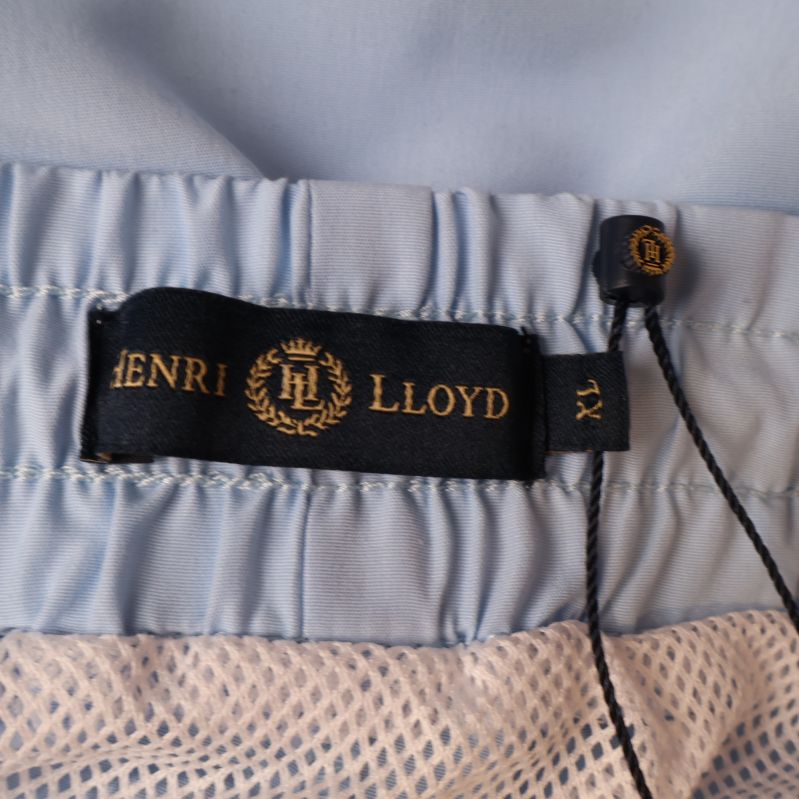 Henri Lloyd etikett inuti shortsen